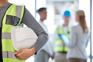 Image showing Helmet, architecture and construction worker in office meeting, planning and project management for building. Engineering, hands zoom and safety gear of contractor people, builder and industry staff