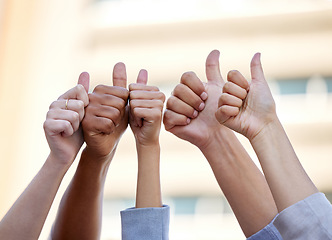 Image showing Hands, thumbs up and support with business people to like in agreement, unity or solidarity together outdoor. Thank you, motivation and team building with a group of colleagues or employees outside