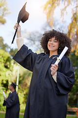 Image showing Graduation, success and woman student or graduate celebrate an achievement on university or college campus. Happy, happiness and person with a certificate, scholarship or diploma from education event