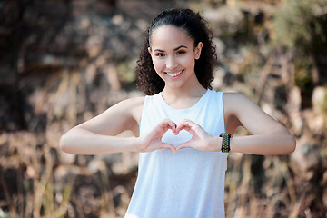 Image showing Happy woman, portrait smile and heart hands for fitness, healthy wellness or exercise in nature. Fit, active and sporty female person smiling with loving shape hand for workout or health outdoors