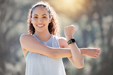 Image showing Happy woman, fitness and stretching arms for exercise, workout or training in the nature outdoors. Portrait of fit or active female person smiling in warm up stretch, exercising or healthy wellness