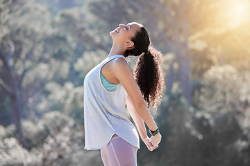 Image showing Happy woman, relax and stretching body in fitness, exercise or outdoor workout in nature. Fit, active and sporty female person smiling in warm up stretch, exercising or training for healthy wellness