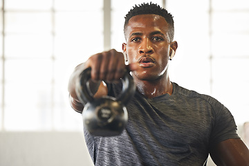 Image showing Kettlebell, fitness and black man with gym workout, bodybuilder challenge and training with health and focus. Young athlete or professional person sweating for sports exercise, muscle and power goals