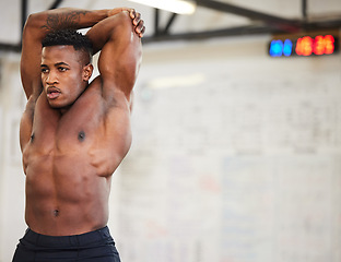 Image showing Shirtless black man, stretching and fitness in gym with muscle, strong and abs with workout and mockup space. Serious male athlete, bodybuilder with warm up and ready for exercise with muscular arms