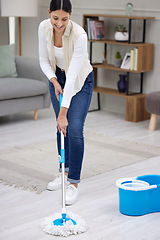 Image showing Woman, mop living room floor and cleaning with hygiene and maintenance, housekeeping and smile while working. Disinfection, clean bacteria and female housekeeper with house work service and routine