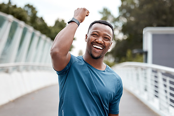 Image showing Success, running and portrait of black man in city for winner, freedom and celebration. Fitness, workout and exercise with male runner training in outdoors for achievement, health and cardio