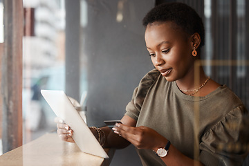 Image showing Tablet, credit card code and black woman at a coffee shop with technology and ecommerce app. Online shopping, African female person and digital payment in a cafe and restaurant with tech and website