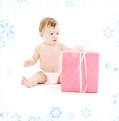 Image showing baby boy in diaper with big gift box