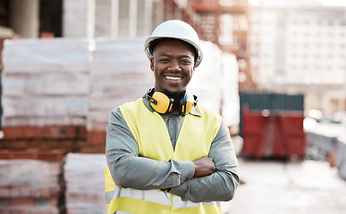 Image showing Black man, portrait smile and arms crossed for construction, project management or architecture in city. Happy African male person, engineer or architect smiling in confidence for industrial building