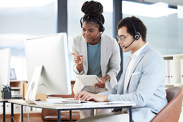 Image showing Call center, coaching and black woman with employee on computer for learning customer service work. Training, tablet and man with mentor for telemarketing, teamwork or collaboration of sales agents.