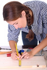 Image showing woman carpenter at work 