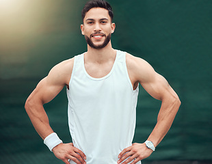 Image showing Sports, tennis and portrait of happy man with confidence, fitness mindset and muscle on game court. Workout goals, pride and happiness, male athlete with smile, motivation for health and wellness.