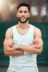 Image showing Sports, tennis court and portrait of happy man with arms crossed, fitness mindset and confidence in game. Workout goal, pride and confident male athlete with motivation for health, wellness and sport