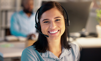Image showing Call center, portrait and business woman in office for customer service, telemarketing or support at night. Face, smile and female sales agent, consultant or employee working on consulting deadline.