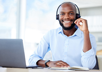 Image showing Portrait, call center and black man with telemarketing, smile and customer service with a laptop, headphones and advice. Face, male person and happy consultant with headset, friendly and tech support