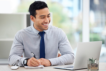 Image showing Happy, manager or businessman working in office or writing in notebook, report and laptop for corporate job. Man, smile and employee planning with notes, research or business analytics on company