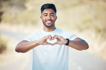 Image showing Happy man, fitness and portrait with heart hands in nature for cardio health or workout exercise outdoors. Fit, active or sport male person, athlete or runner with loving emoji and smile for training