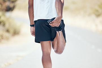 Image showing Stretching, running and closeup of man in road for training, workout and exercise. Muscle, fitness and cardio performance with legs of male runner and warm up in nature for marathon, start and health