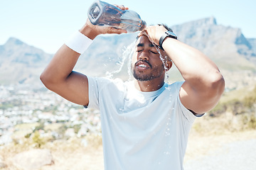 Image showing Pour water, fitness and face of man on mountain for exercise, marathon training and running. Sports, nature and male person refresh with liquid for wellness, cardio workout and hydration to cool down