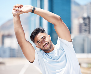 Image showing Stretching, running and fitness with man in city for cardio, marathon and performance. Workout, exercise and health with male runner and body warm up in road for training, sports and competition