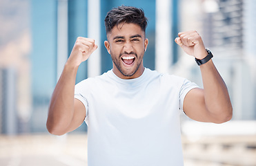 Image showing Happy man, fitness and fist in city for winning, celebration or achievement in the outdoors. Excited male person, athlete or runner in joyful happiness for workout success or exercise in a urban town