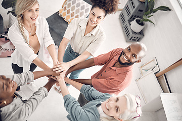 Image showing Teamwork, hands together and portrait of business people with smile, support and trust from above. Design team, coworking and hand circle in office, happy employees with cooperation and diversity.