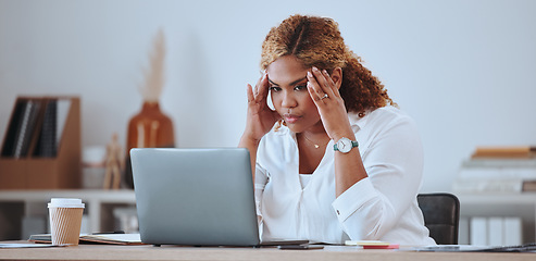 Image showing Stress, angry and woman with a startup fail, headache and sad in a company office desk working on a laptop. Frustrated, burnout and young entrepreneur thinking of a risk or problem, tired and mistake