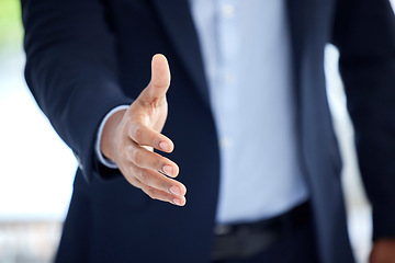 Image showing Business, man and hand with negotiation in closeup for an interview with entrepreneur at a company. Professional male, welcome and meeting with an offer with trust and support for hiring at office.