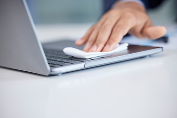 Image showing Closeup, business and hands cleaning, laptop and wiping with hygiene, bacteria and disinfecting. Male person, professional and dust with technology, pc and cloth for germs, prevention and sanitize