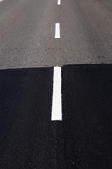 Image showing part of the old and new asphalted road