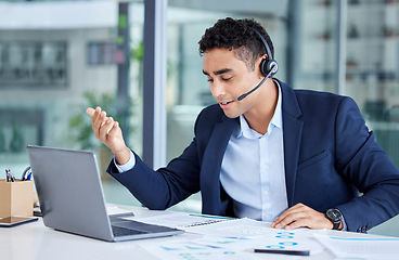 Image showing Professional, man and working at call centre with communication at a company with customers. Male consultant, customer service and online with helping clients with consulting or sales at a business.