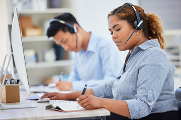 Image showing Telemarketing, business woman writing and contact us help in a office with notes at desk. Call center, African female employee and consulting of a worker with web phone support and agent advice