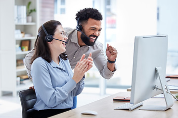 Image showing Computer, call center and people winning, success and celebration of target, sales and online profit in telecom. Telemarketing agency, team or woman and man celebrate, applause and yes for bonus