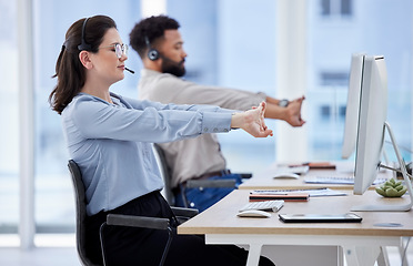 Image showing Business people, call center and stretching hands in customer service, CRM support or telemarketing at the office. Man and woman consultant or agent in warm up stretch or contact us at the workplace