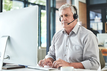 Image showing Mature, contact us and call center writing of a professional at a computer for telemarketing job. Senior expert, web support and consultation of male person at desk for business and customer service.
