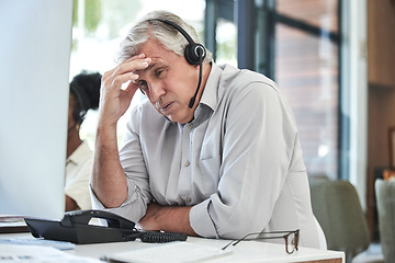 Image showing Stress, telemarketing manager and man with headache in customer service agency with pain or crisis. Communication fail, senior management with computer or help desk consultant with problem phone call