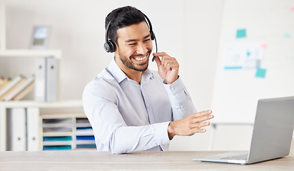 Image showing Telemarketing, man with a headset and laptop at his desk of a modern office workstation. Consultant or online communication, crm or customer service and male call center agent happy at workplace