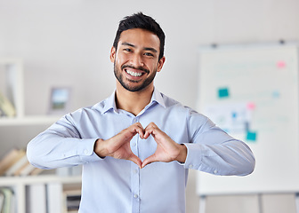 Image showing Heart hands, smile and portrait of man in office with ideas and happiness for future start up project. Businessman, love hand sign or emoji for excited business deal, service and care with kindness