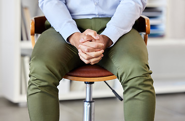 Image showing Hands, clasped and person waiting or anxious due to fear, stress or mental health problem in a workplace. Nervous, scared and closeup of hand of patient in psychology office for wellness