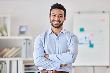 Image showing Smile, education and portrait of man teacher in a classroom or school and happy to study in a college or university. Academy, educator and young person or worker arms crossed and confident in class