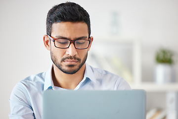 Image showing Laptop, business man and accountant in office, workplace or company. Computer, working and Asian male professional, entrepreneur or auditor work on accounting, reading email or focus on web research