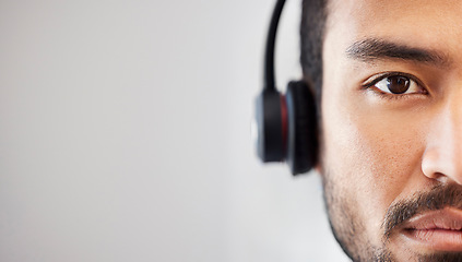 Image showing Portrait of man, mockup or virtual assistant in call center tech support consulting in telemarketing in headset. Mock up space, face or serious consultant in telecom sales with headphones in studio