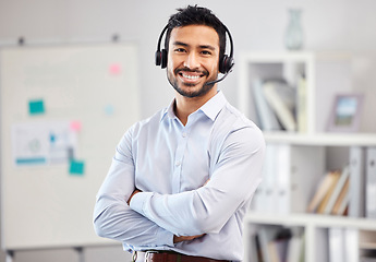 Image showing Arms crossed, portrait or happy man in call center tech support consulting, speaking or talking in telemarketing. Communication, face or friendly consultant smiling in telecom sales with microphone