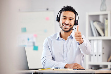 Image showing Call center, portrait or happy man with thumbs up for agreement in customer services help desk. Smile, thumb up or Asian sales agent with like, success or yes hand sign in telecom for CRM success