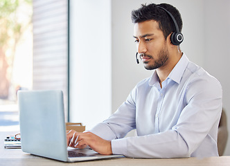 Image showing Call center, laptop and focus with business man in office for consulting, customer service and communication. Contact us, search and help desk with employee for technical support and telemarketing