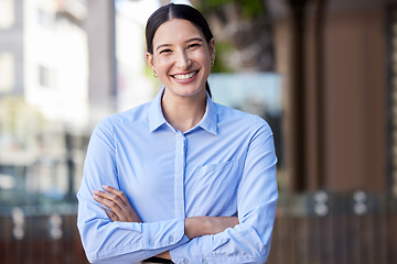 Image showing Business woman, portrait smile and arms crossed in confidence for small business management in city. Happy and confident female person or creative employee smiling for startup or goals in urban town