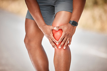 Image showing Fitness, knee pain and injury with a sports man outdoor in nature for cardio or endurance running. Exercise, medical or anatomy accident with a male athlete holding a joint while training for health