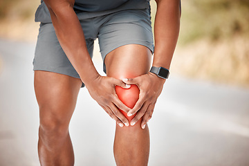 Image showing Fitness, knee pain and accident with a sports man outdoor in nature for cardio or endurance running. Exercise, medical or anatomy injury with a male athlete holding a joint while training for health