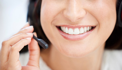 Image showing Woman with smile, face and closeup with call center, happy agent teeth with communication and contact us. CRM, customer service and female consultant mouth with headset mic, positivity and telecom