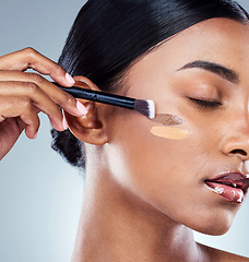 Image showing Makeup brush, foundation shade and woman with cosmetics, natural beauty and skincare. Cosmetic, young female model and self care with contour and face product with highlighter for skin glow in studio